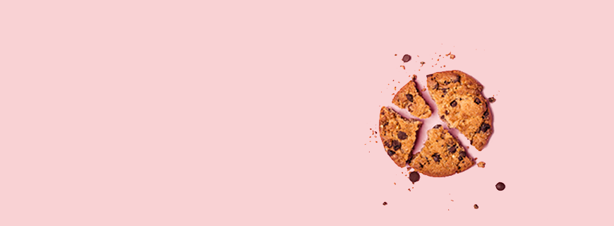 pink background with a broken cookie